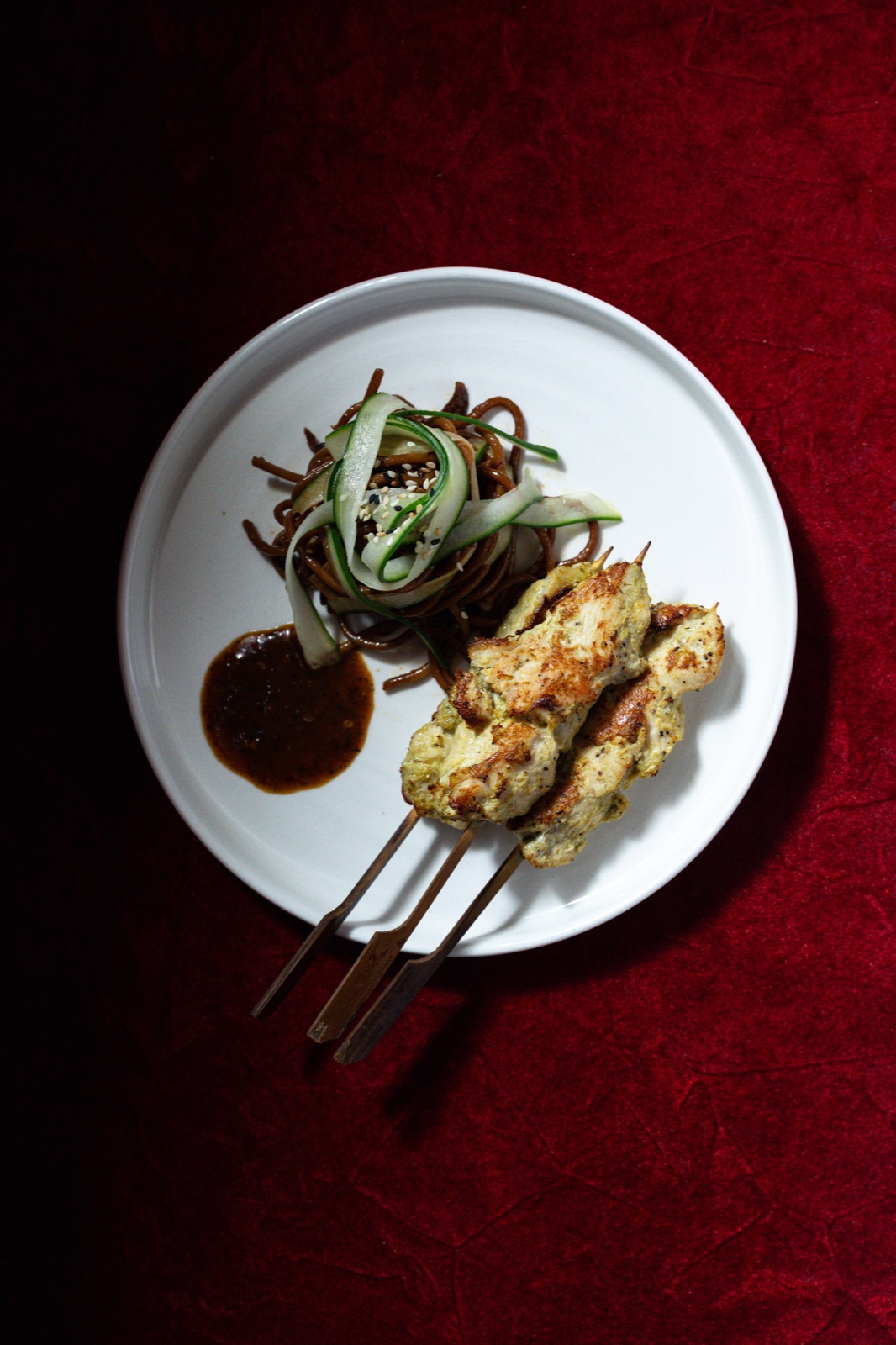 Lemongrass chicken skewers with cold Asian noodles